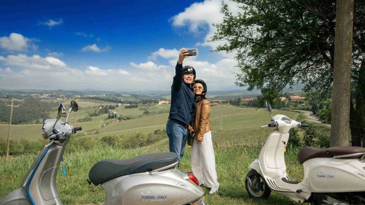 Vespas parked at a Chianti winery on a Vespa wine tasting tour from Florence