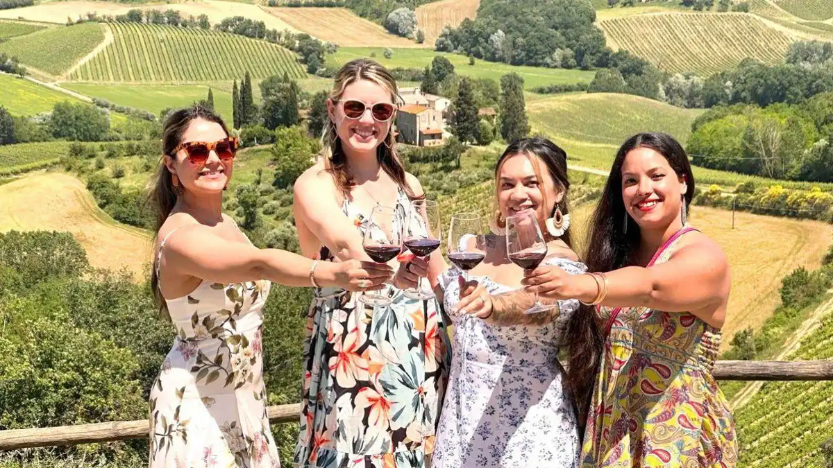 The towers of San Gimignano above vineyards on a Tuscany wine tour from Florence